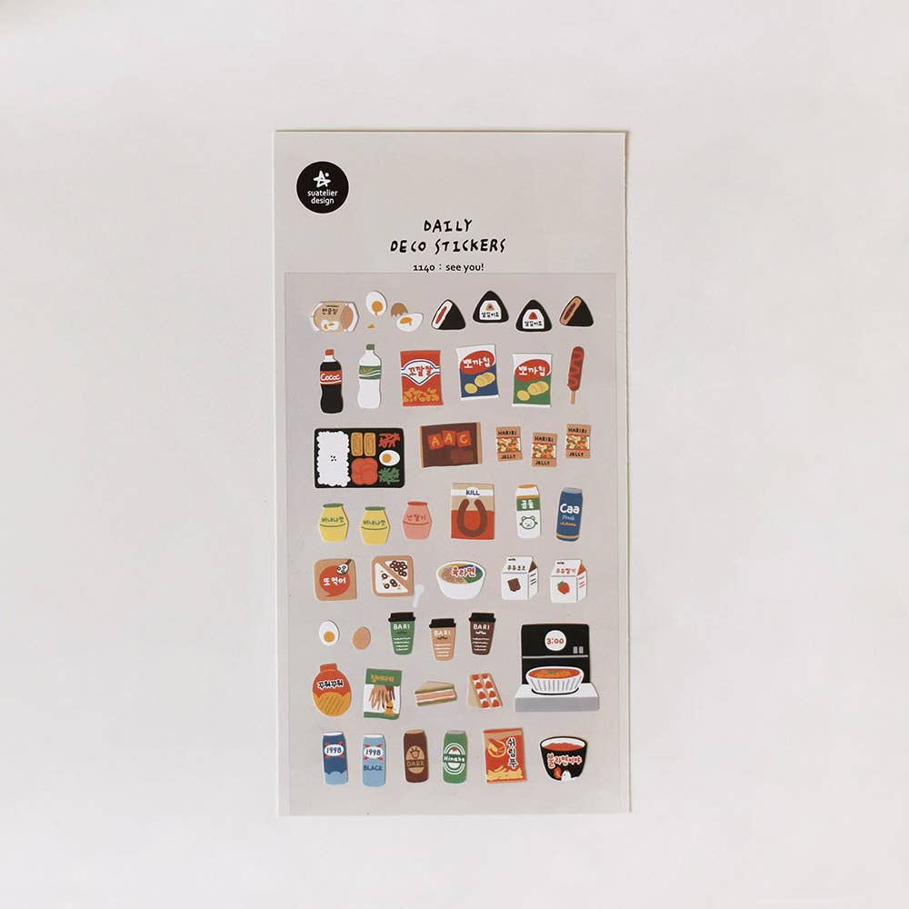 Sheet of decorative stickers with various Japanese food on a light gray background
