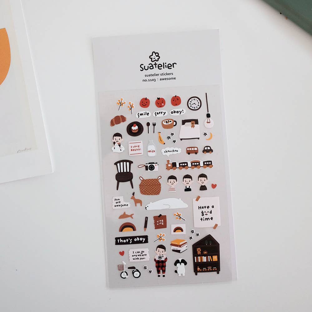 Sheet of decorative Suatelier stickers with various illustrations on a white background