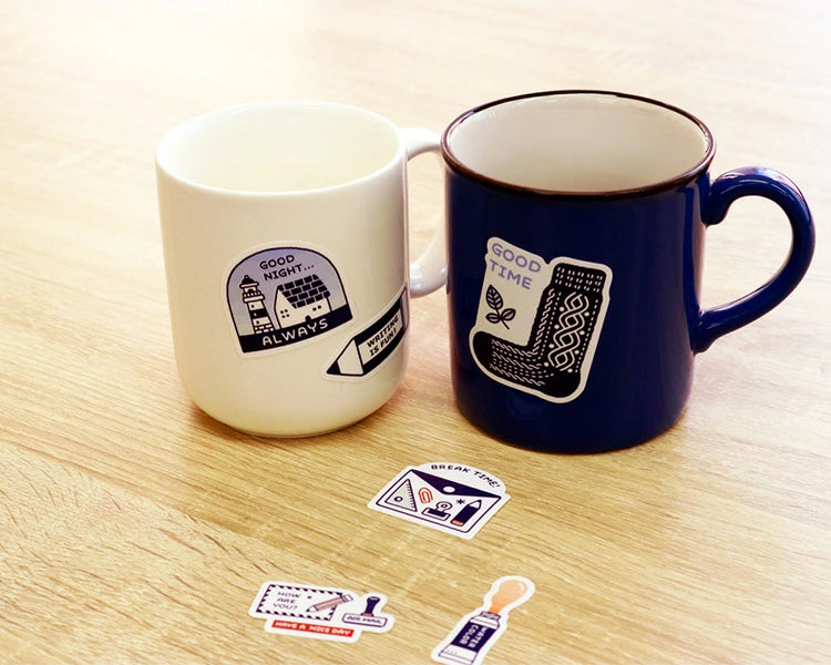 Sanby x Eric Small Things Multi-Stickers on a couple mugs