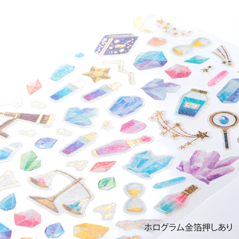 Collection of colorful decorative gem stickers on a white background