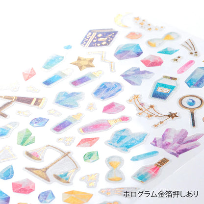 Collection of colorful decorative gem stickers on a white background