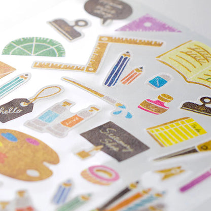 Collection of colorful stationery-themed stickers on a white background