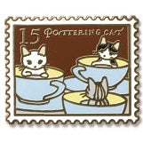 Pottering Cat Enamel Pin - Tea Cup Ride